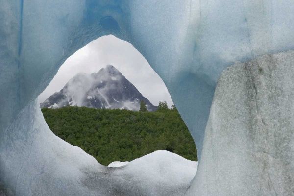 Alaska, Alsek Lake Mountain framed by iceberg